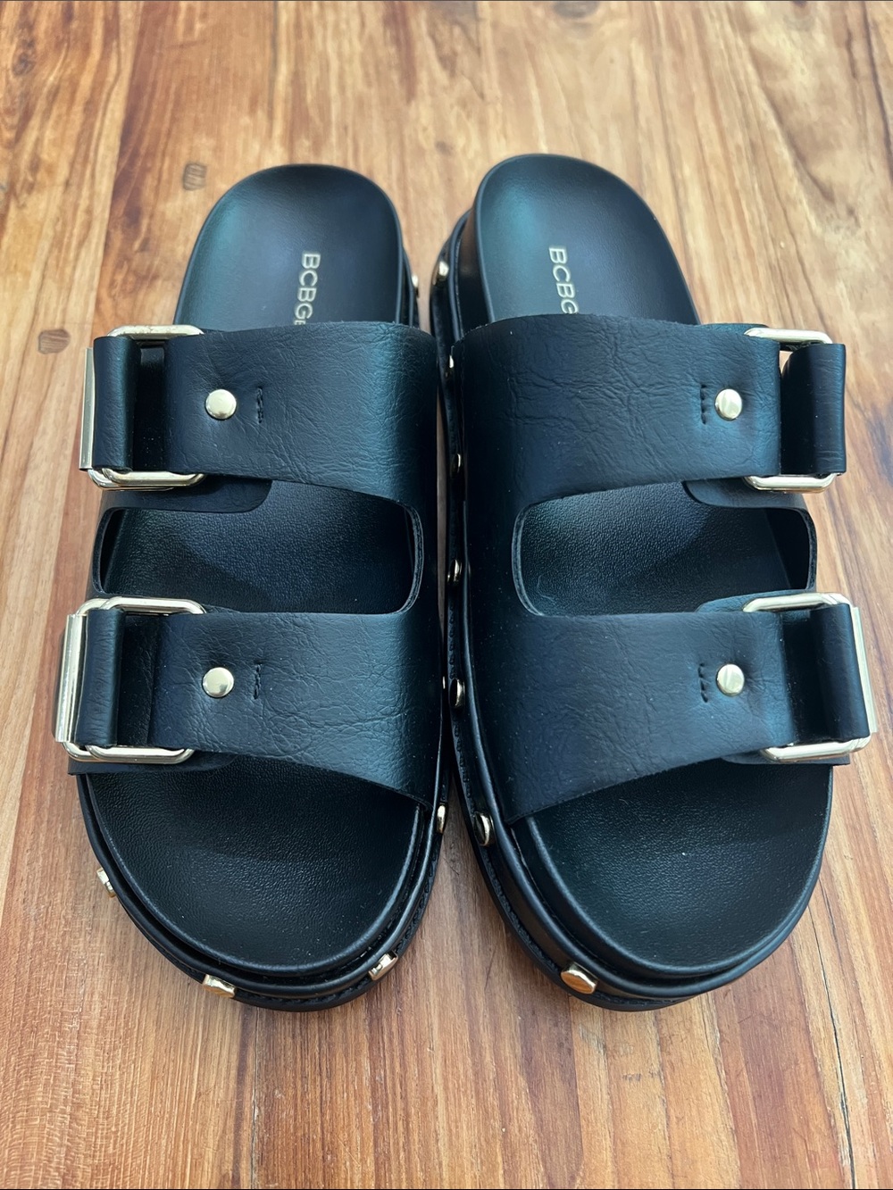 BCBG Black Leather Double-Buckle Slide Sandals with Gold Accents